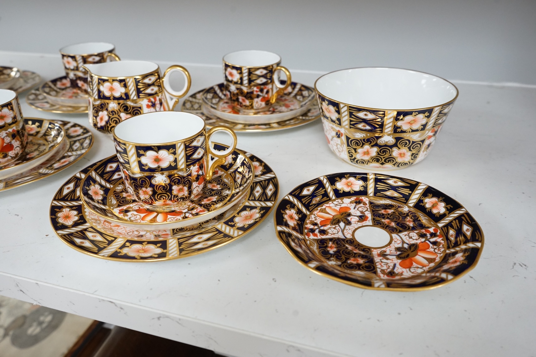 A Royal Crown Derby Imari pattern part tea service to include trios, bowl and jug